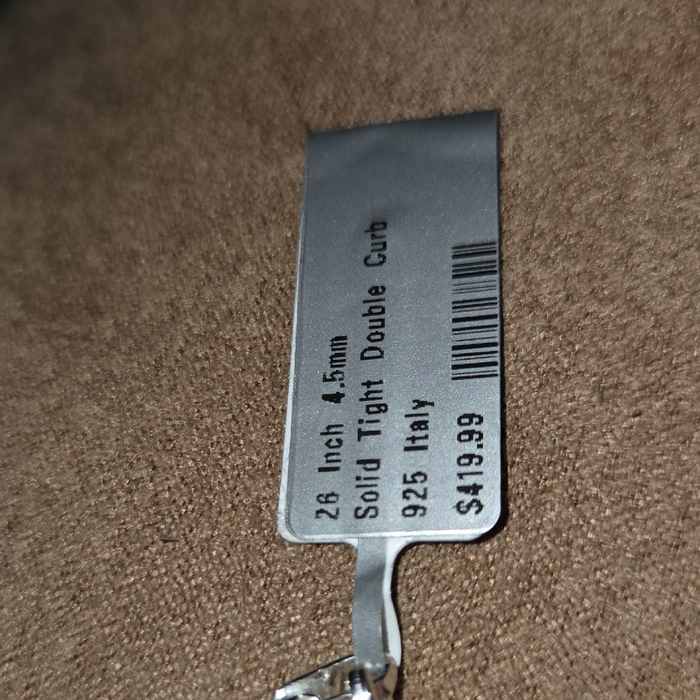 Elegant Silver Necklace with Tag